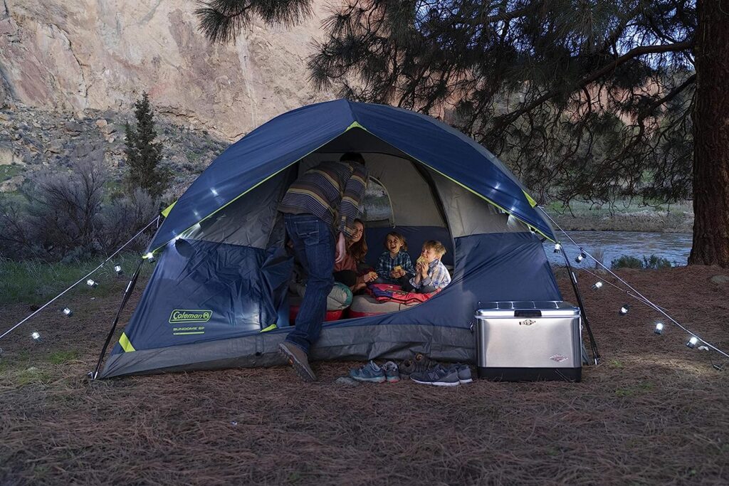 Coleman Sundome Camping Tent, 2/3/4/6 Person Dome Tent with Easy Setup, Included Rainfly and WeatherTec Floor to Block Out Water, 2 Windows and 1 Ground Vent for Air Flow with Charging E-Port Flap